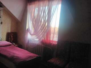 Хостелы Beliy Kakadu Ужгород Кровать в общем 6-местном номере для мужчин и женщин-3